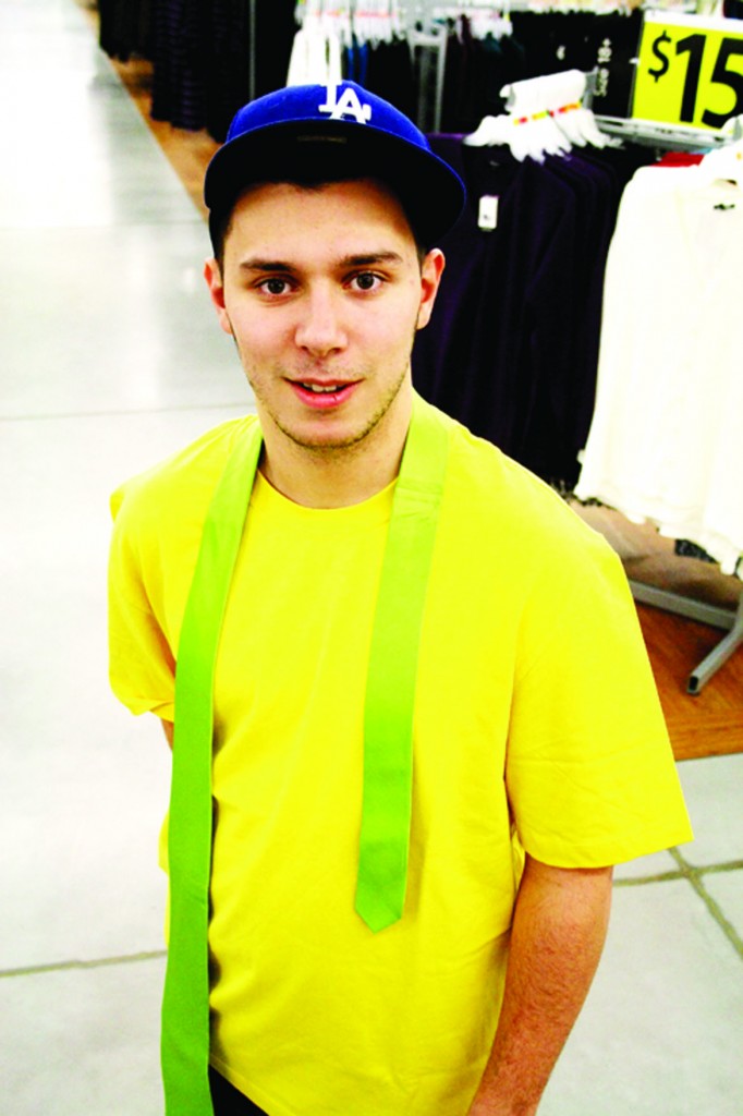 PHOTO BY REYHAN ENVER Elton Garcia, a Kitchener resident, shows off some of this year’s popular colours while shopping at a Kitchener Wal-Mart.