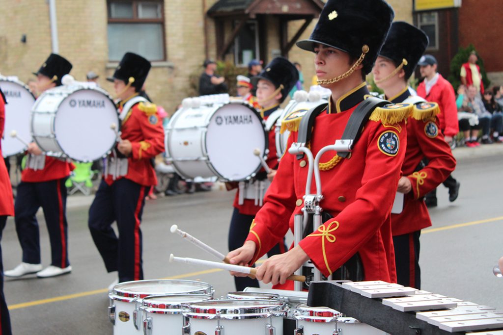 Drummers in the Burlington Teen Tour Band march in the parade. Thousands of people were in attendance and non-perishable food was collected along the route. 
