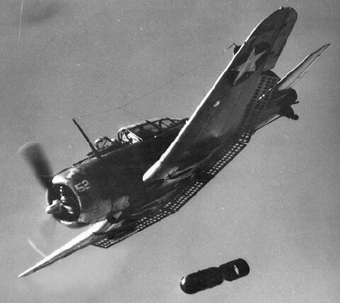 A US Navy Dauntless drops a bomb