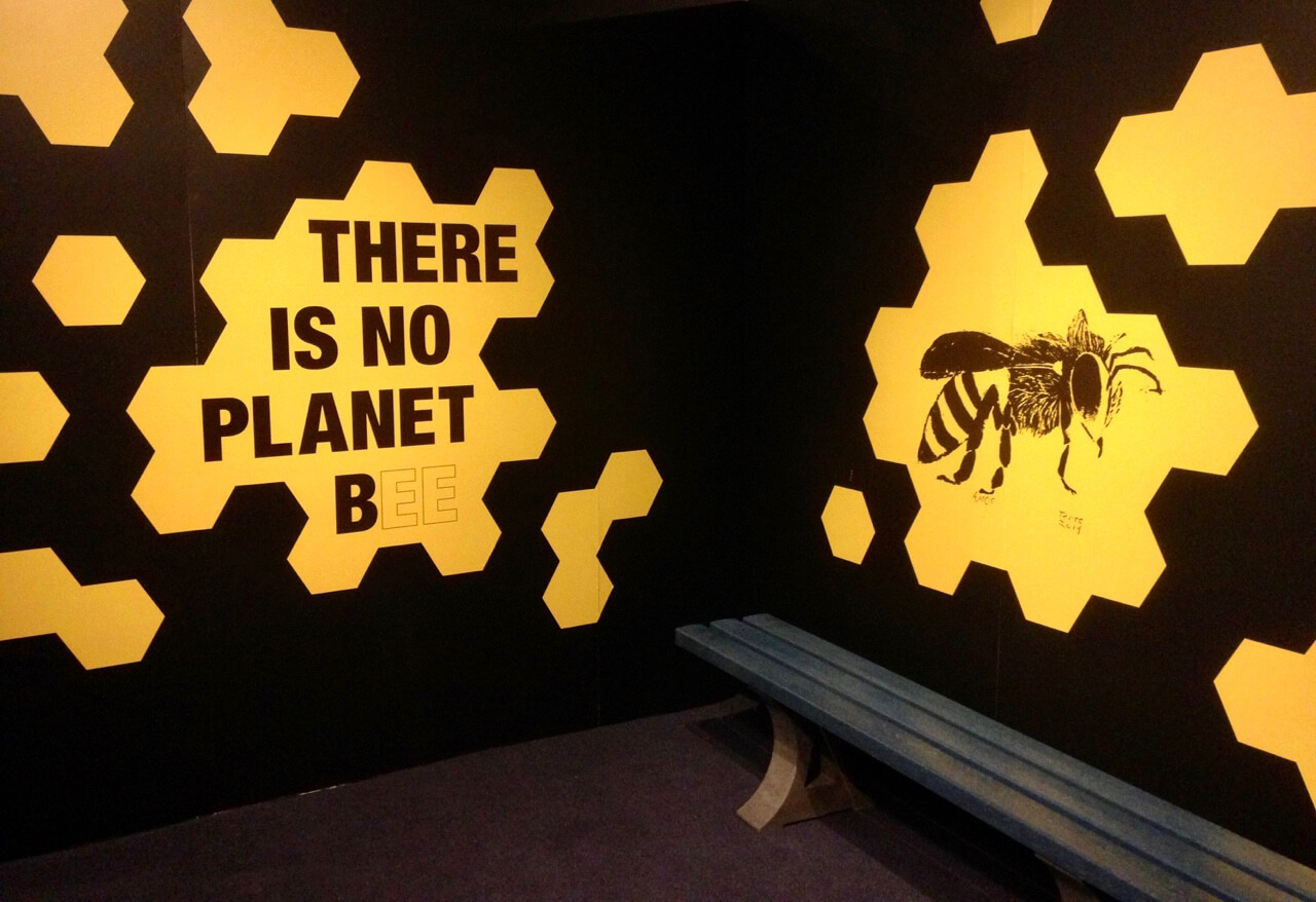 "There is no Planet Bee" reads this wall art, featuring honeycomb patterns of gold on black and, of course, the image of a bee