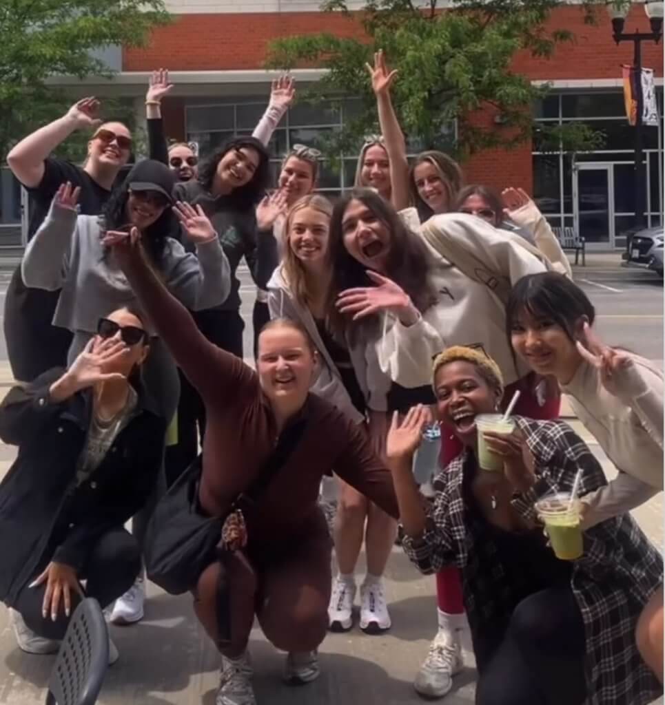 Aisley Ellis and some of the women who participated in one of her Hustl Hot Girl Walks, taken during the summer of 2025. Photo by Aisley Ellis
